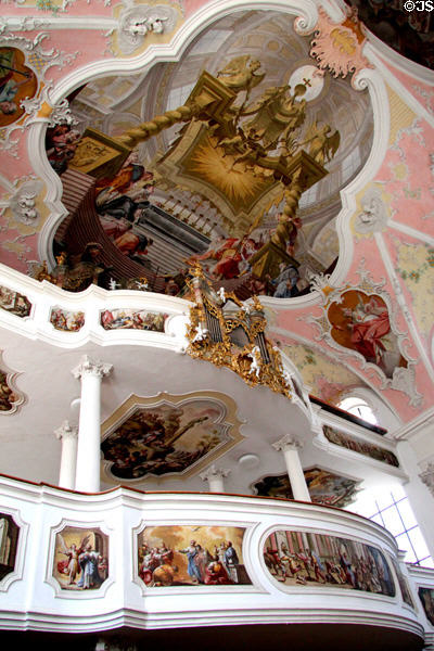 Baroque organ loft under tromp l'oeil baldachin at St Peter & Paul church. Oberammergau, Germany.