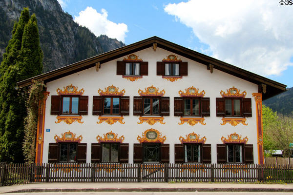 Alpine-style house (1818) (42 Ettaler Str.) with painted window surrounds. Oberammergau, Germany.