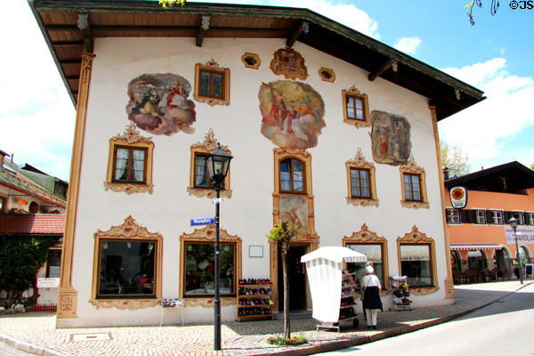 Building with painted window surrounds & murals in town centre. Oberammergau, Germany.