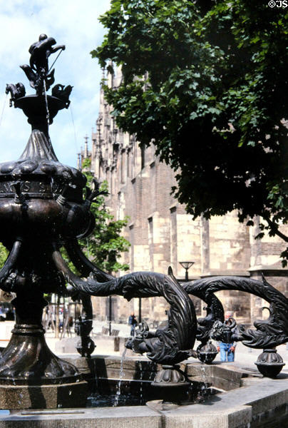 Fountain featuring dolphins outside Ulm Münster. Ulm, Germany.