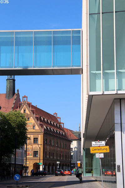 Elevated walkway, framing historic town hall adorned with murals, between Kunsthalle Weishaupt & Ulm Museum. Ulm, Germany.