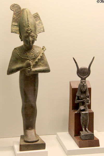 Bronze statues (7th - 4thC BCE) of Egyptian Gods Osiris & Isis with her son Horus on her knees at Museum of Bread and Art. Ulm, Germany.