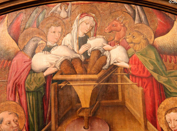 Detail of symbols of Evangelists feeding grain into Machine to make Christian host painting (c1470) by master of Hostienmühlen-Retabels of Ulm at Ulmer Museum. Ulm, Germany.