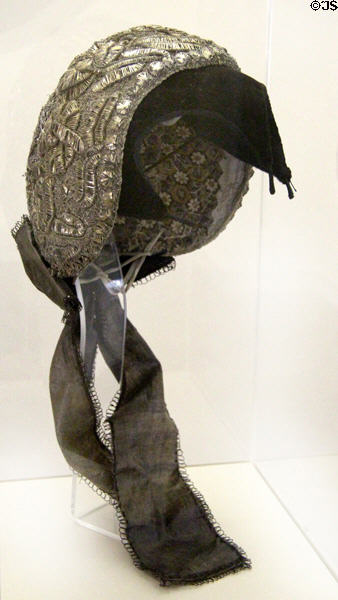 Ulmer hood or cap of material with silver & gold threads (19thC) at Ulmer Museum. Ulm, Germany.