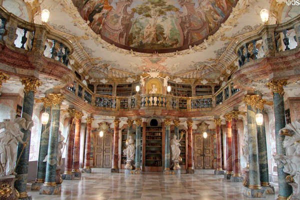 Rococo library with some of the 32 columns, painted alternately in pink & blue, supporting the gallery at Kloster Wiblingen. Ulm, Germany.