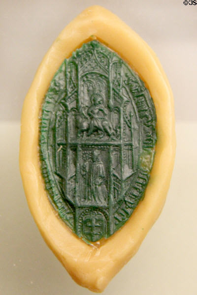 Seal of Abbot Ulrich (1426) Above: St Martin on horseback; Middle: St Benedict; Below: Wiblingen Monastery coat of arms at museum of Kloster Wiblingen. Ulm, Germany.