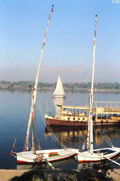 Traditional Felucca sailboats on Nile at Luxor. Egypt.