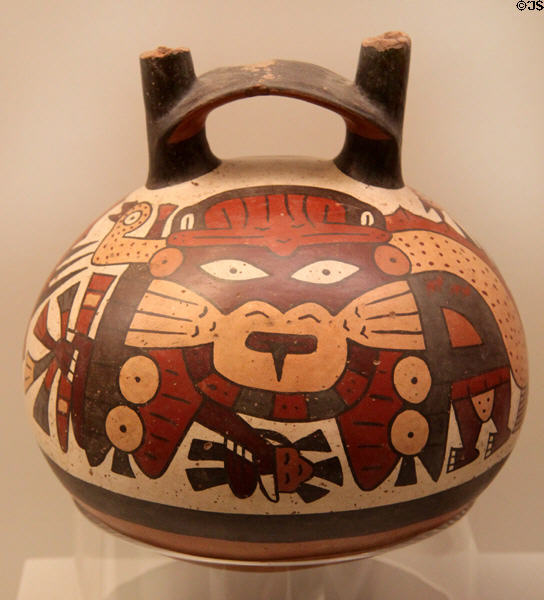 Nazca culture ceramic bridge-handle global vessel with figure painting (100-700) from Peru at Museum of America. Madrid, Spain.