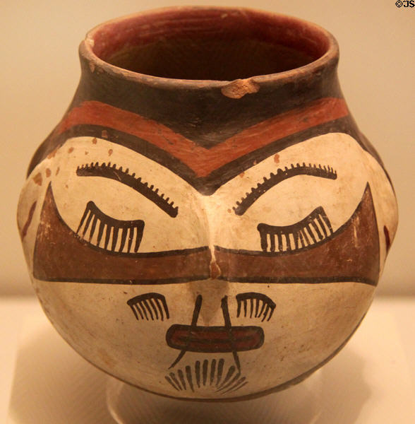 Nazca culture ceramic global vessel with trophy face (100-700) from Peru at Museum of America. Madrid, Spain.