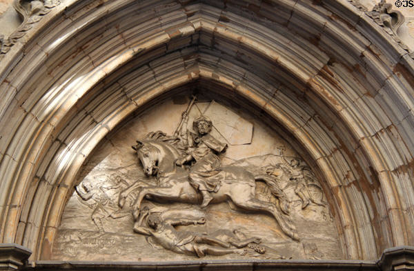Relief of St James the Moorslayer over entrance of St James Church (14thC) (Carrer de Ferran 28). Barcelona, Spain.