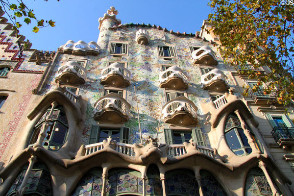 Colored tile decorates facade of Gaudi's Casa Batlló. Barcelona, Spain.