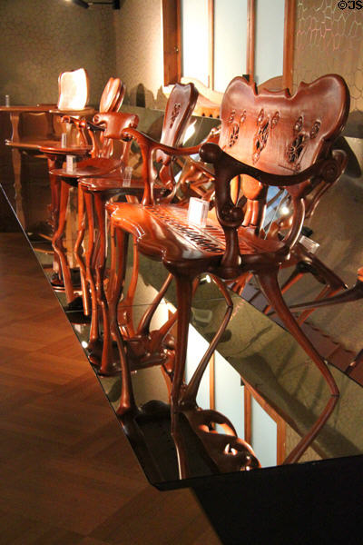 Collection of Gaudi designed chairs at Casa Batlló. Barcelona, Spain.