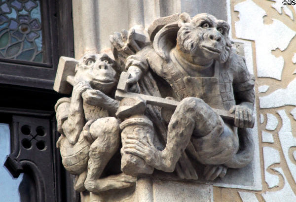 Carved monkeys with tools on Casa Amatller. Barcelona, Spain.