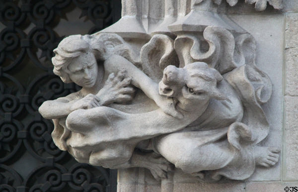 Carved man fighting dragon on Casa Amatller. Barcelona, Spain.