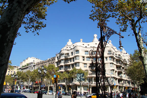 Passeig de Gràcia streetscape with Casa Milà. Barcelona, Spain. Style: Modernista.