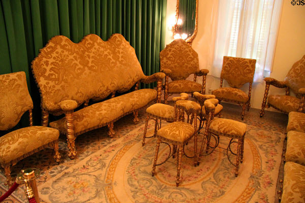 Upholstered furniture from Calvet Lounge by Antoni Gaudí at Gaudi House Museum in Parc Güell. Barcelona, Spain.