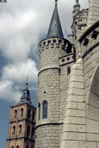 Tower of Episcopal Palace of Astorga by Gaudi with former palace beyond. León, Spain.