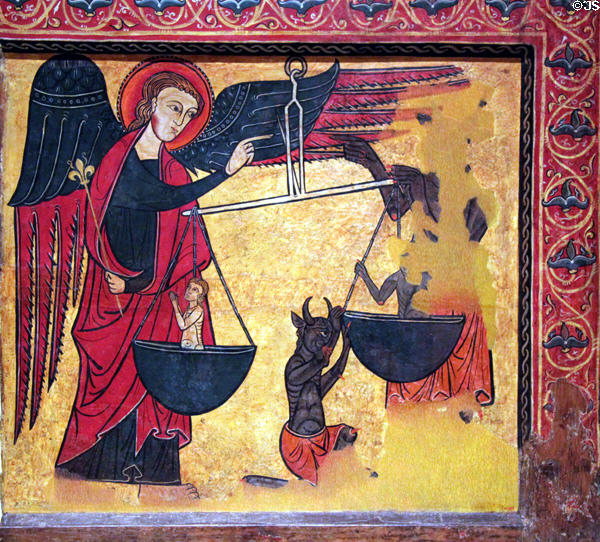 Painting (14th C) of Archangel Michael weighing souls to save them from devil by Master of Soriguerola at Museu Nacional d'Art de Catalunya. Barcelona, Spain.
