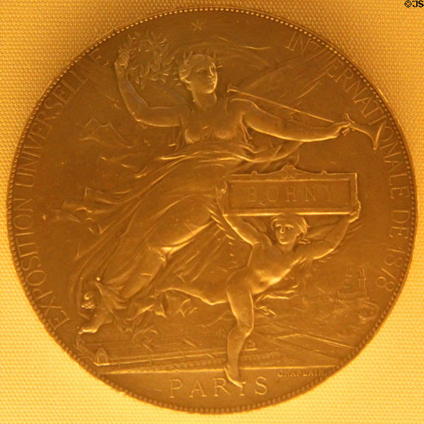 Medal showing figure of victory from Universal Exposition of Paris (1878) by Jules-Clément Chaplain at Museu Nacional d'Art de Catalunya. Barcelona, Spain.