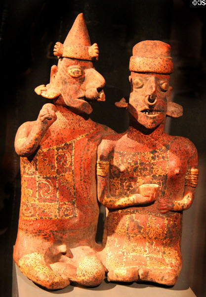 Funerary ceramic couple statue (100-500) from Nayarit, Mexico at Barbier Mueller Precolumbian Art Museum. Barcelona, Spain.