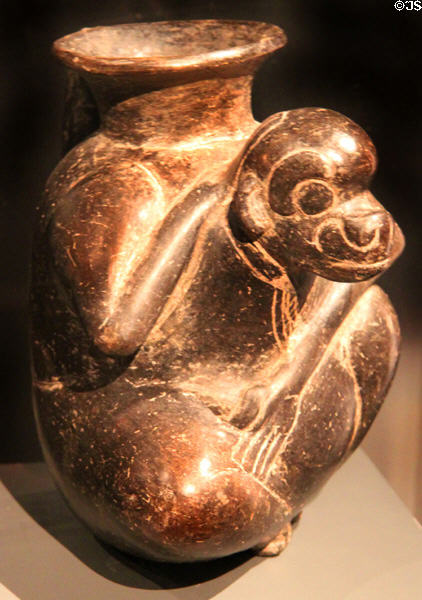 Ceramic vase (100-300) in form of monkey from Maya Guatemala at Barbier Mueller Precolumbian Art Museum. Barcelona, Spain.