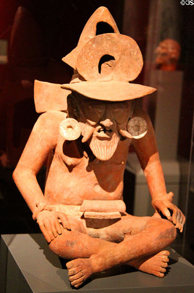 Terracotta censor of fire deity called Huehuetéotl (600-800) from Veracruz, Mexico at Barbier Mueller Precolumbian Art Museum. Barcelona, Spain.