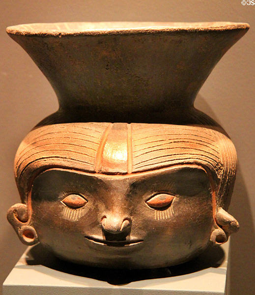 Ceramic head vessel (900-400 BCE) from Chavin Culture, Peru at Barbier Mueller Precolumbian Art Museum. Barcelona, Spain.