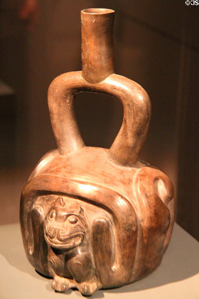 Ceramic stirrup-handle vessel with animal (900-400 BCE) from Cupisnique Culture, Peru at Barbier Mueller Precolumbian Art Museum. Barcelona, Spain.