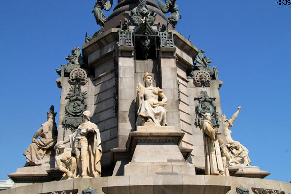 Figures of representing realms of Spain plus medallions of people connected with Columbus at base of Columbus Monument. Barcelona, Spain.