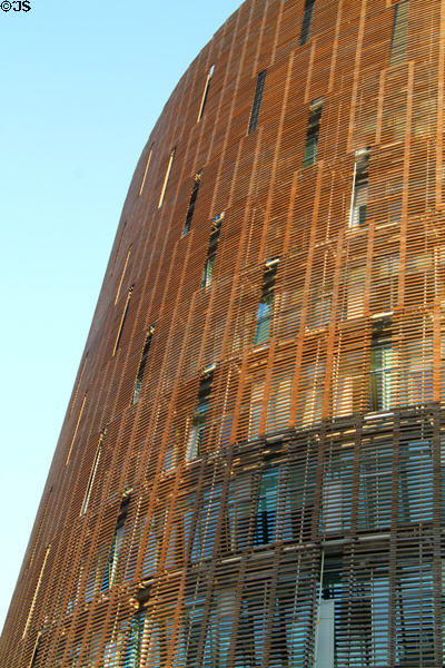 Red cedar screened facade of Biomedical Research Park. Barcelona, Spain.