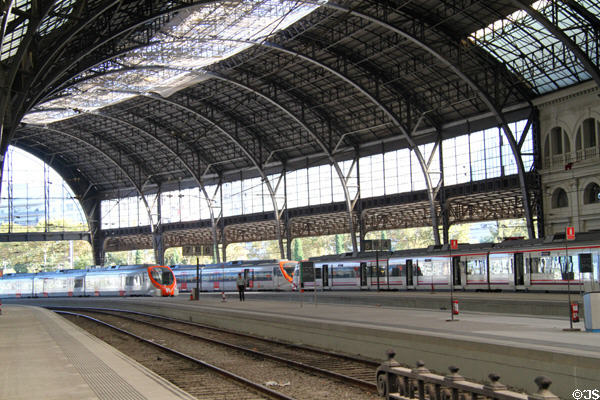 Curving metal vault over rail tracks of Estació de França. Barcelona, Spain.