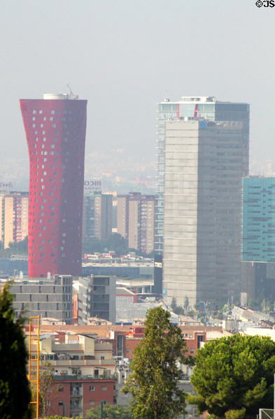 Hotel Porta Fira in red (2010) (26 floors) (Plaça d'Europa 45) plus other highrises of L'Hospitalet de Llobregat. Barcelona, Spain. Architect: Toyo Ito & Assoc. Architects + b720 Fermín Vázquez Arquitectos.