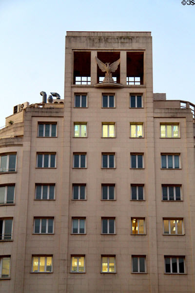 Corner building with Griffon statue (Gran Vía Corts Catalanes 604 or Balmes 15). Barcelona, Spain.