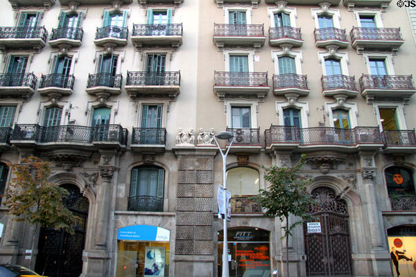 Matched pair of Modernista row houses (Balmes 107-109). Barcelona, Spain.
