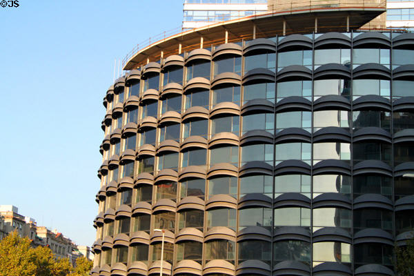 Modern building with metal awnings (Plaça de Calvo Sotelo 10). Barcelona, Spain.