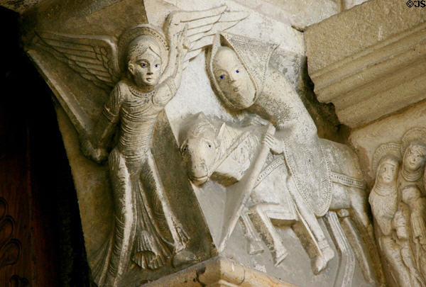 Detail of pilgrim on horse to right of tympanum of Cathedral St Lazarre. Autun, France.