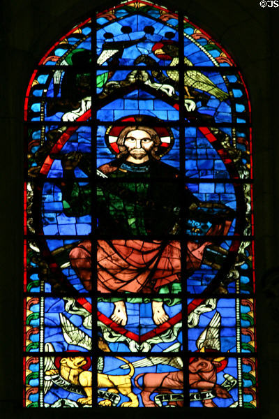 Stained glass window of Christ with four Evangelist symbols in Cathedral St Étienne. Auxerre, France.