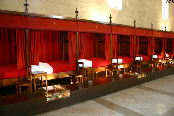 Beds in great hall of the poor (1452) where patients were treated in Hotel Dieu. Beaune, France.