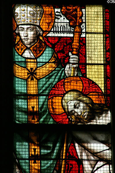 St Nicholas detail of stained glass window in great hall of the poor in Hotel Dieu. Beaune, France.