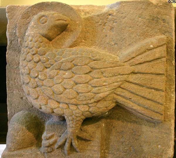 Sandstone relief of eagle of St John the Evangelist (mid 12thC) from Alspach in Unterlinden Museum. Colmar, France.