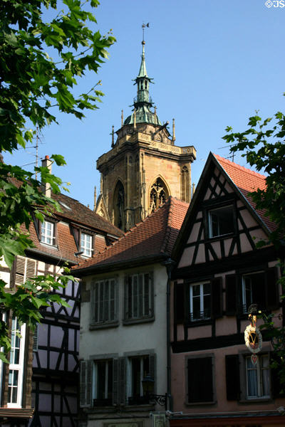 Half-timbered houses & tower of St Martin church. Colmar, France.
