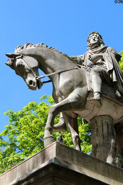 Equestrian statue (1829) of Louis XIII 1610-1643 at center of Place des Vosges garden. Paris, France.