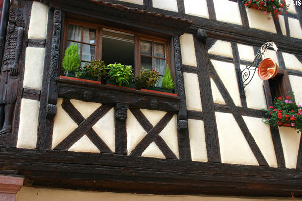 Traditional cake pan used as shop sign. Riquewihr, France.