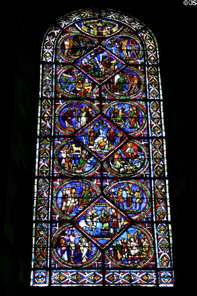 Stained glass window of St Stephen's Cathedral with Biblical stories. Sens, France.