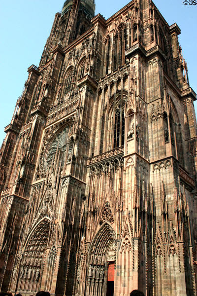Cathedral west front added in 13th c to 1176 red sandstone church plus spire (1399-1439). Strasbourg, France. Style: Gothic.