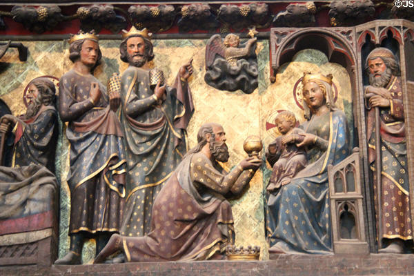 Three kings visit manger on carved stone chancel screen (14thC) in Notre Dame Cathedral. Paris, France.