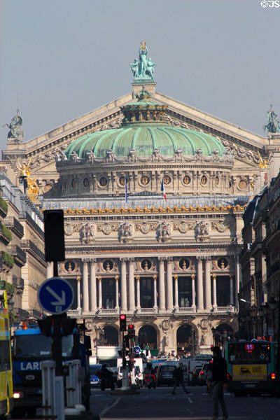 Distant view of Opéra Garnier with dome & Apollo, Poetry & Music sculptural group by Aimé Millet sits at apex. Paris, France.