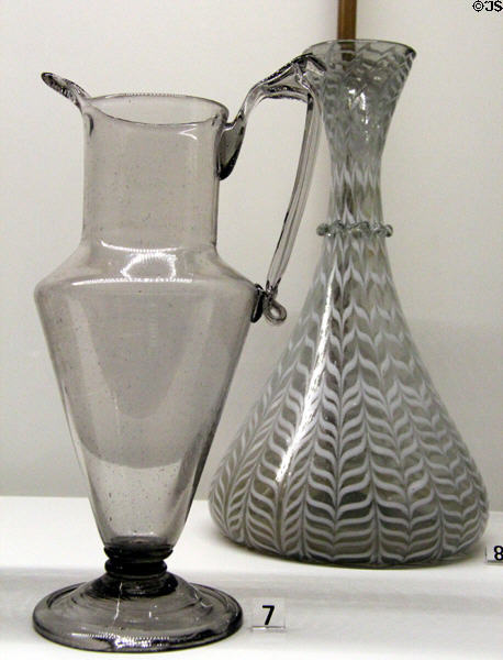 Glass ewer (18thC) from Provence? & vase bottle with combed pattern (17thC) from France at Museum of Decorative Arts. Paris, France.