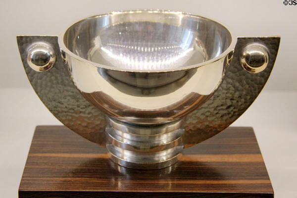 Silvered metal cup on rosewood base (c1935) by Jean Després from Avallon, France at Museum of Decorative Arts. Paris, France.
