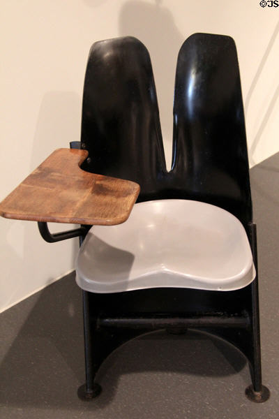 Amphitheater seat with writing desk (1952) by Jean Prouvé from Nancy at Museum of Decorative Arts. Paris, France.